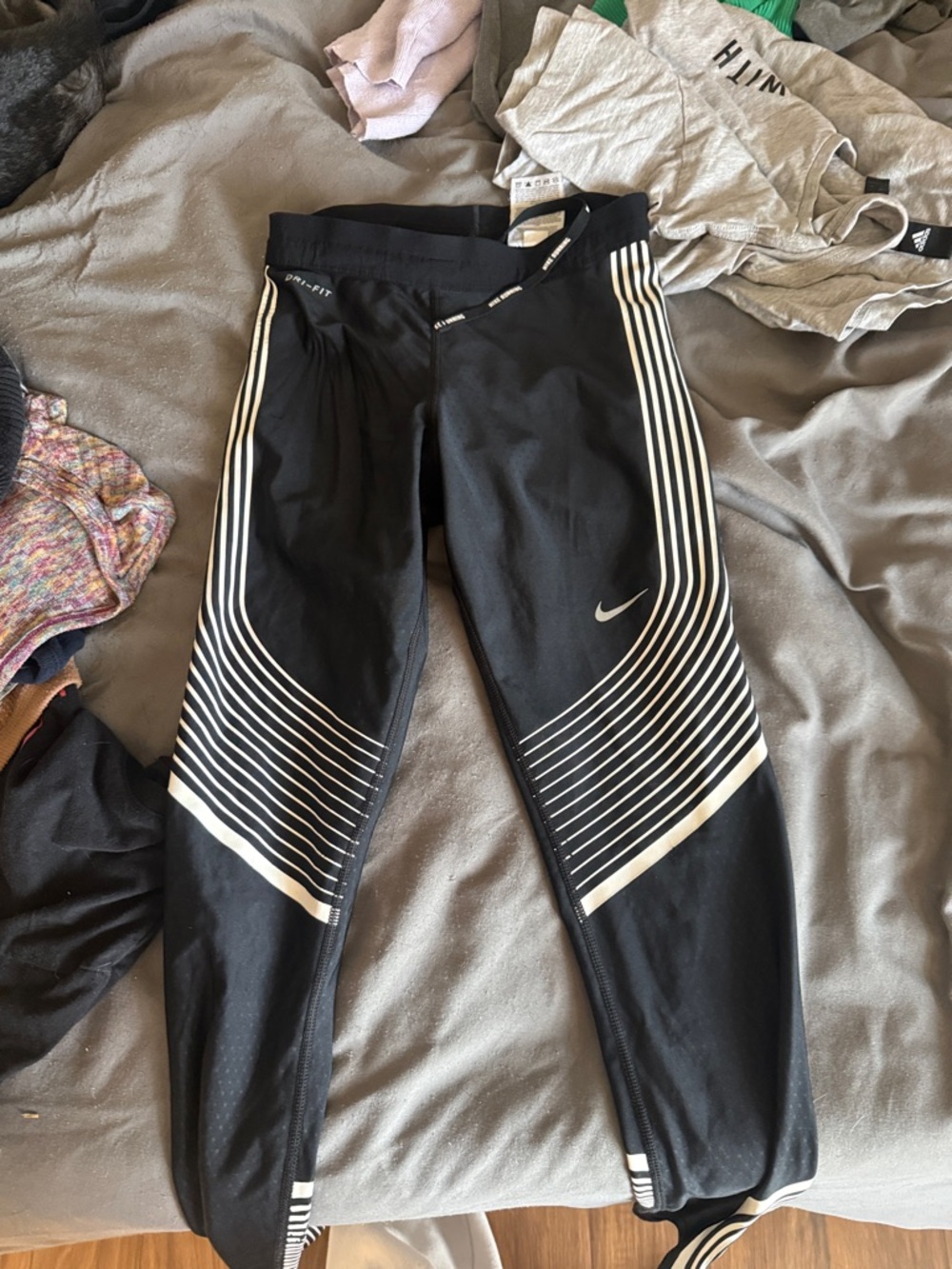 Nike Black Leggings with White Striped Accents